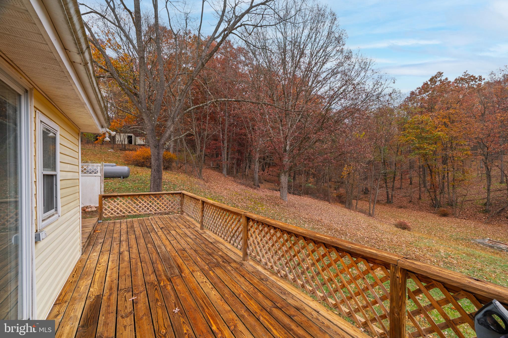 2906 Needmore Road Baker, WV 26801 - Photo 7 of 22 a view of balcony with wooden floor and fence