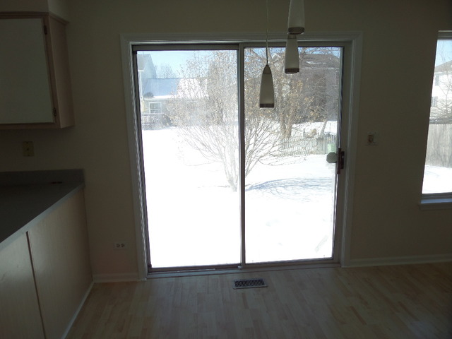 603 Buckboard Road Bolingbrook, IL 60490 - Photo 9 of 24 a view of an empty room and window