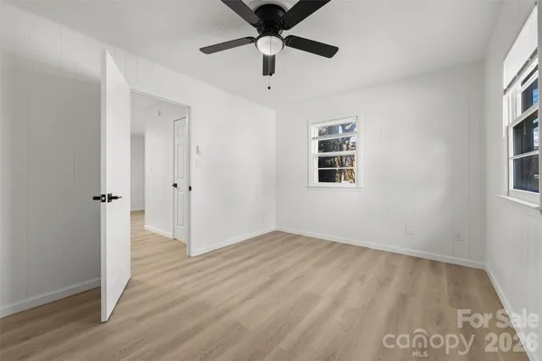 a view of an empty room and window