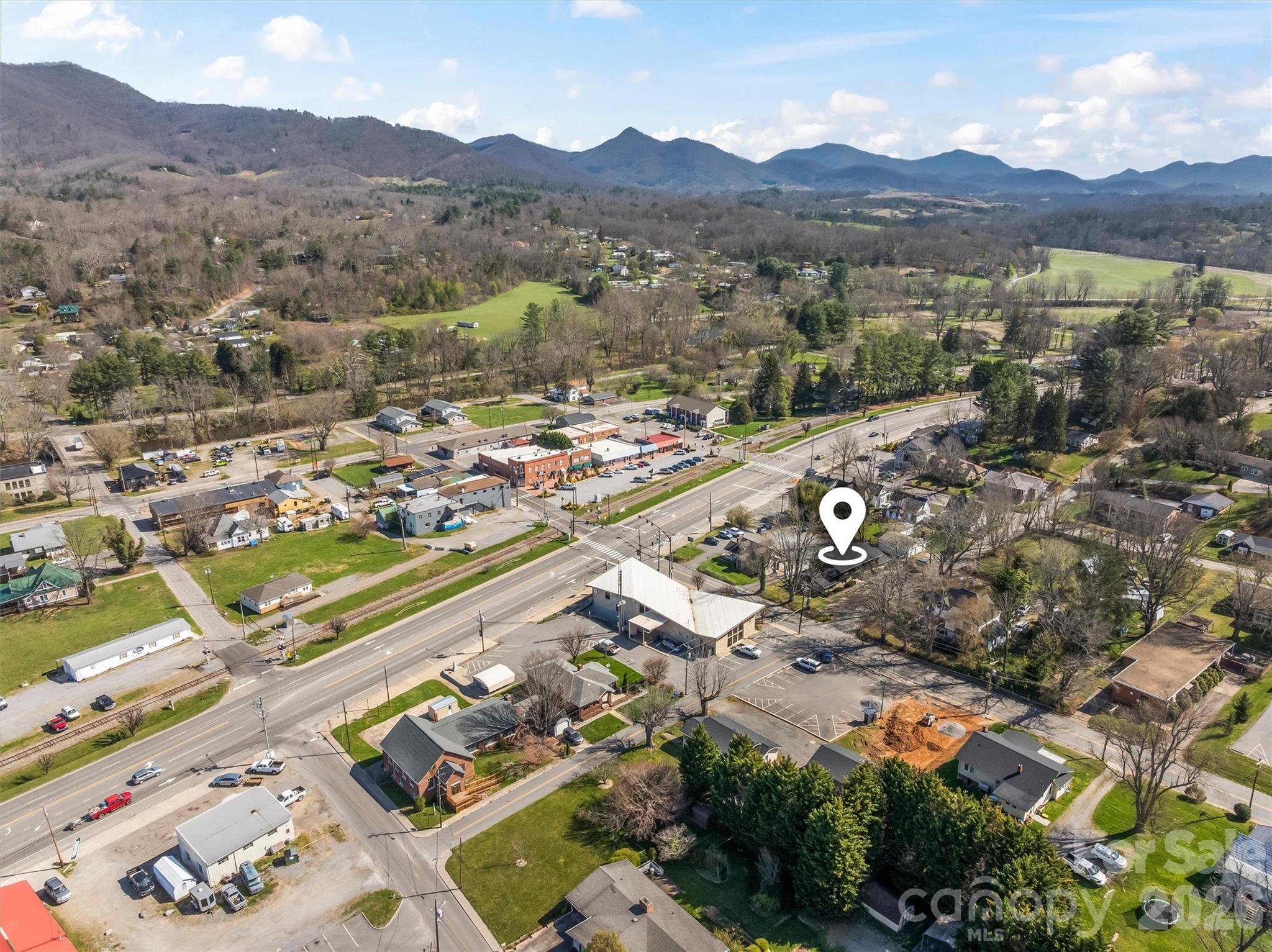 71 Maple Street Clyde, NC 28721 - Photo 22 of 22 a view of a city with a mountain