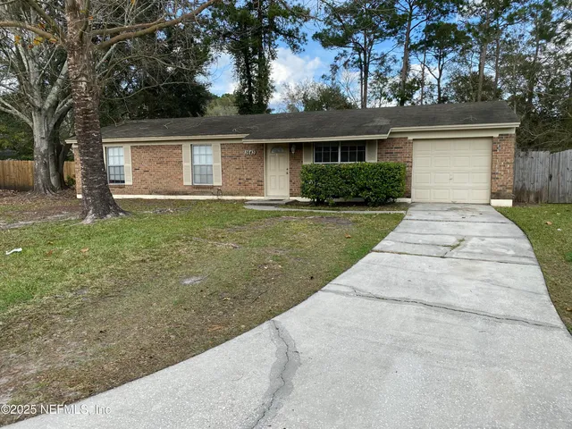 front view of house with a yard