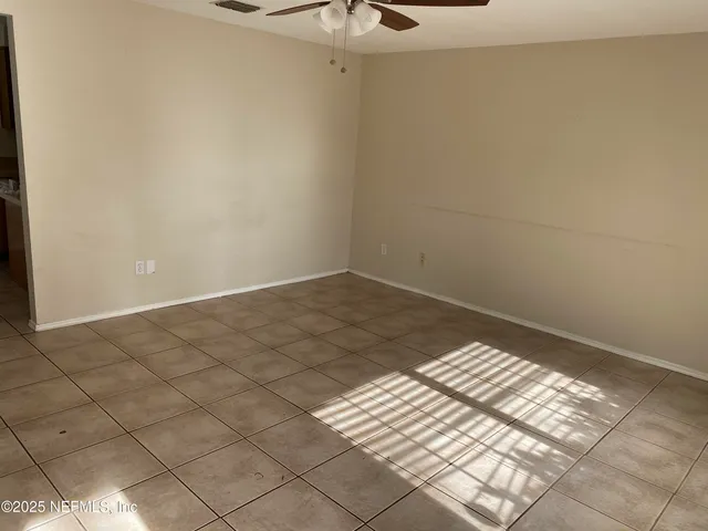 en empty room with windows