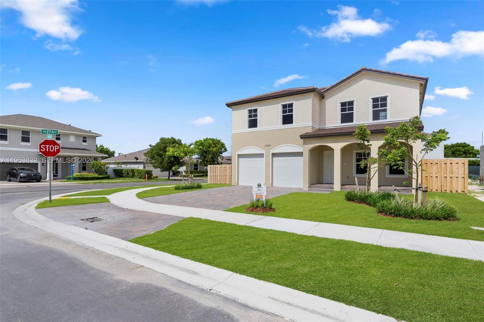 27364 Southwest 133rd Path Homestead, FL 33032 - Photo 2 of 40 a view of house with outdoor space and street view