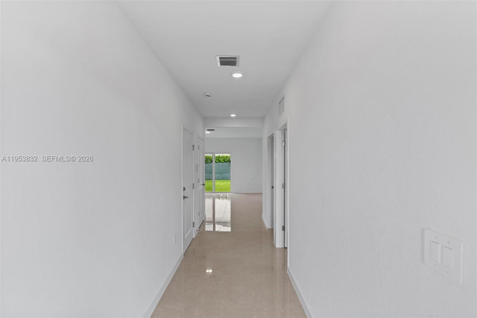 27364 Southwest 133rd Path Homestead, FL 33032 - Photo 6 of 40 a view of a hallway with a chair