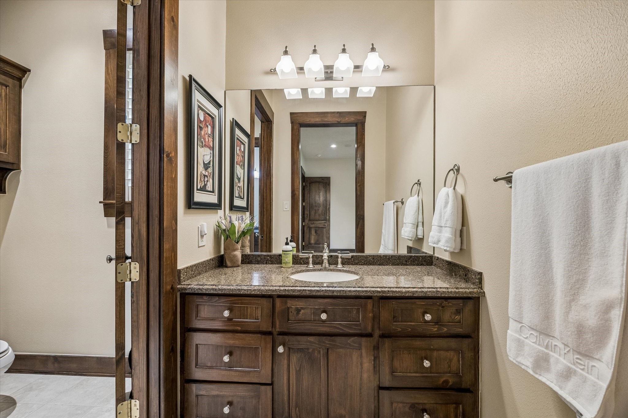 32102 Fulbrook Commons Fulshear, TX 77441 - Photo 27 of 50 Well-appointed with quality finishes, this bathroom offers convenience and comfort for guests and residents alike.