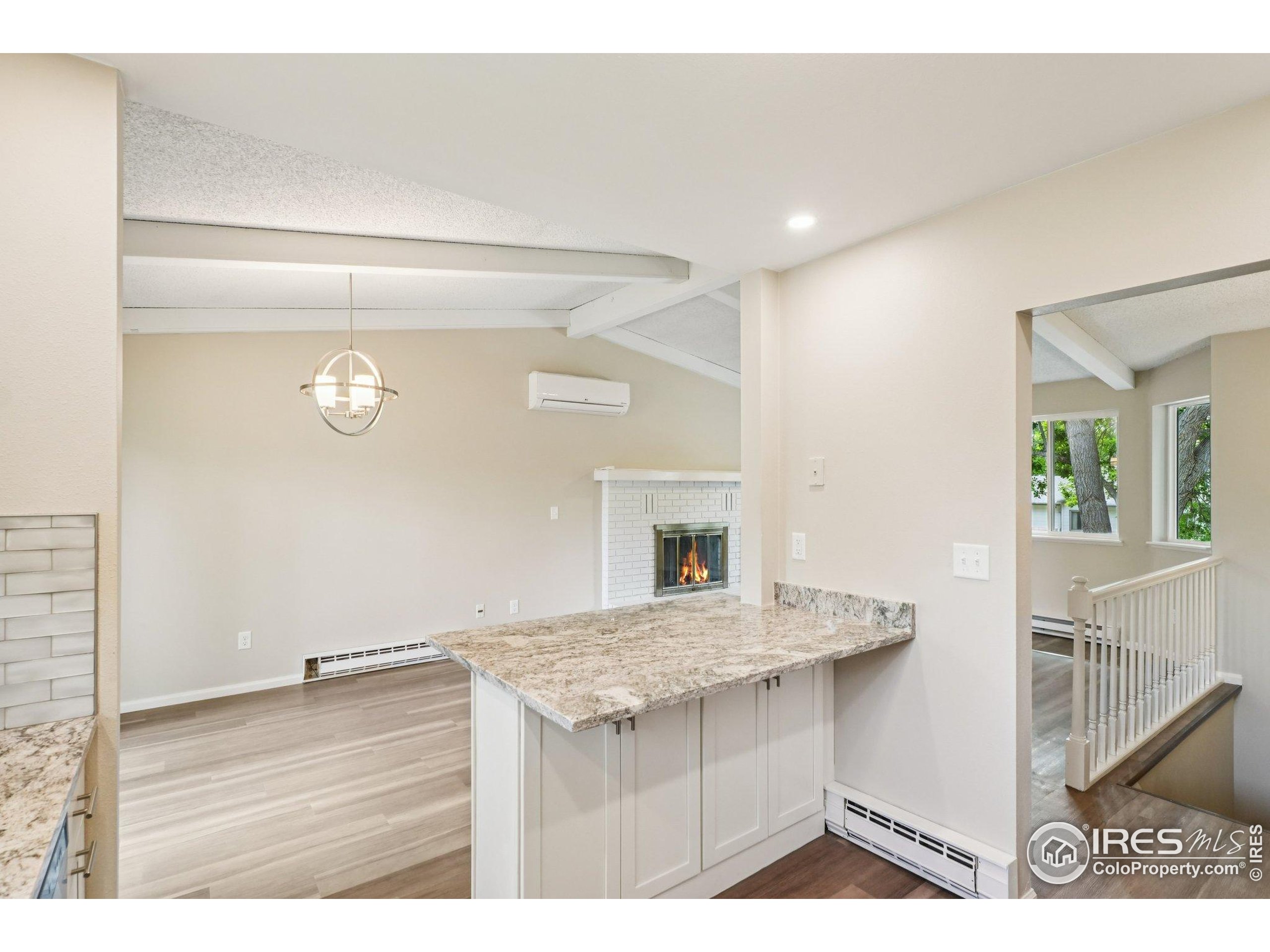 2442 Amherst Street Fort Collins, CO 80525 - Photo 16 of 49 a bathroom with a sink a vanity and a mirror