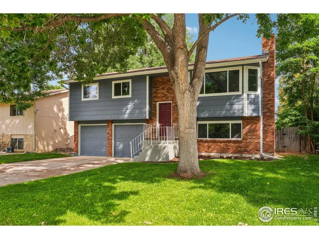 a house view with a garden space