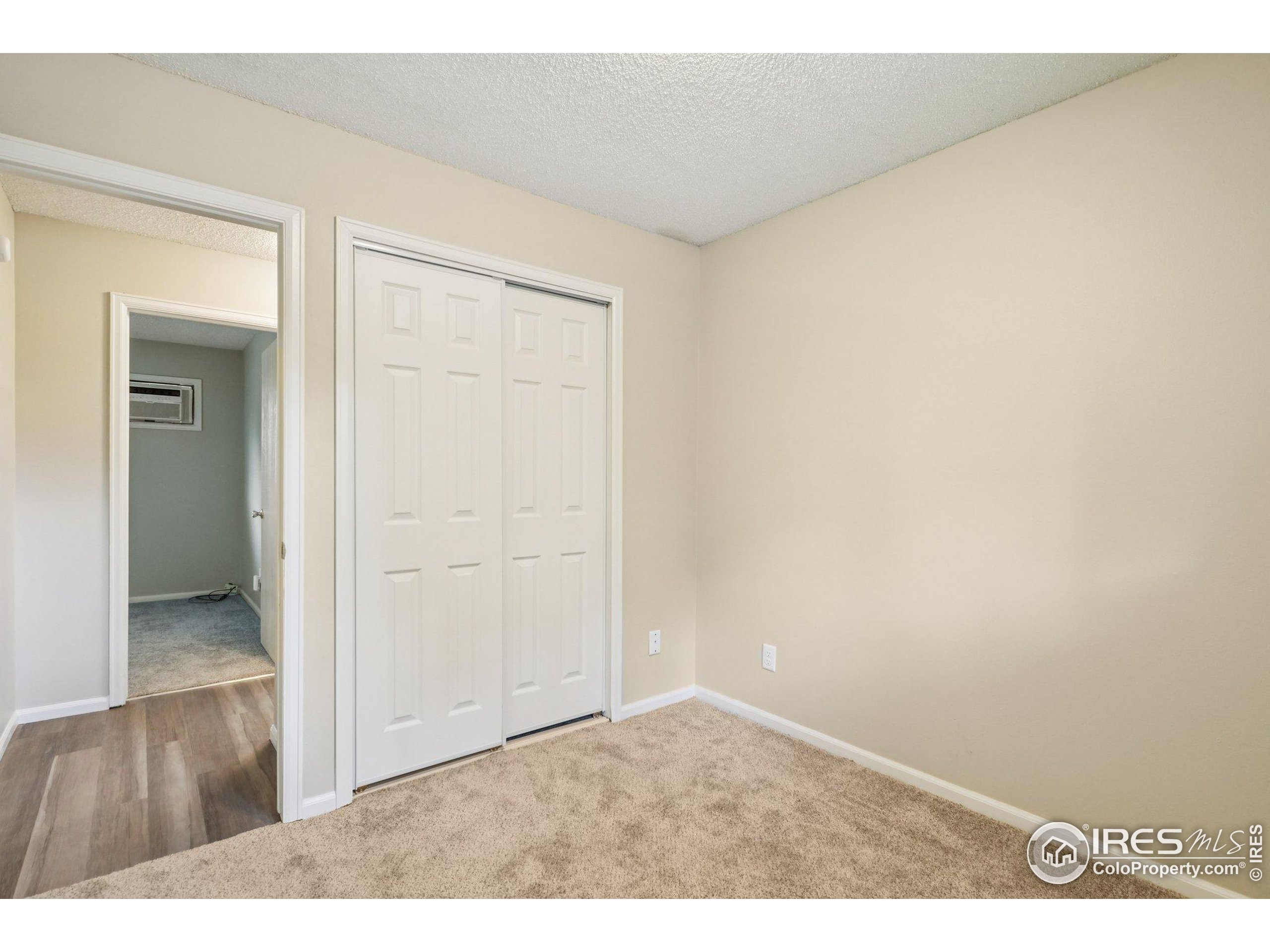 2442 Amherst Street Fort Collins, CO 80525 - Photo 25 of 49 an empty room with closet