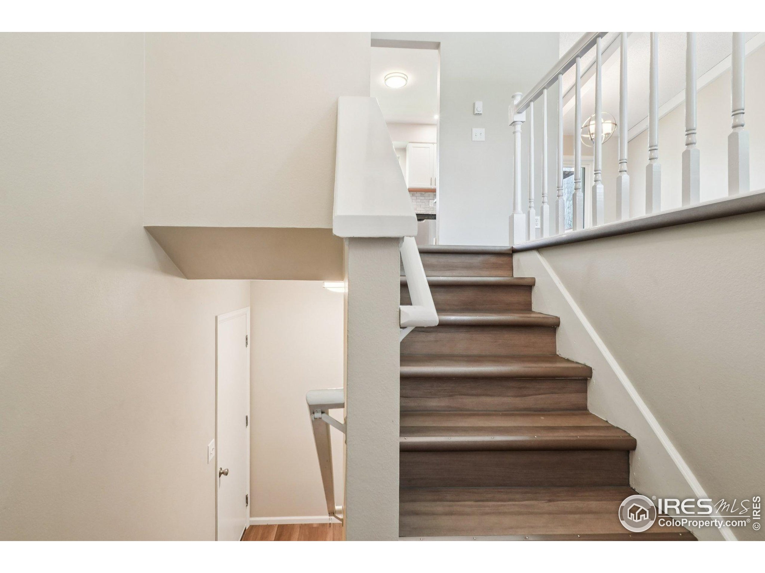 2442 Amherst Street Fort Collins, CO 80525 - Photo 4 of 49 a view of entryway with wooden floor