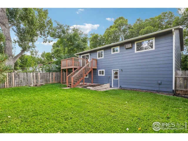 a view of a backyard with a garden