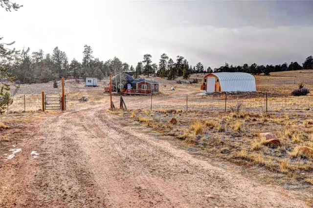 a view of a chairs and table on the wooden floor