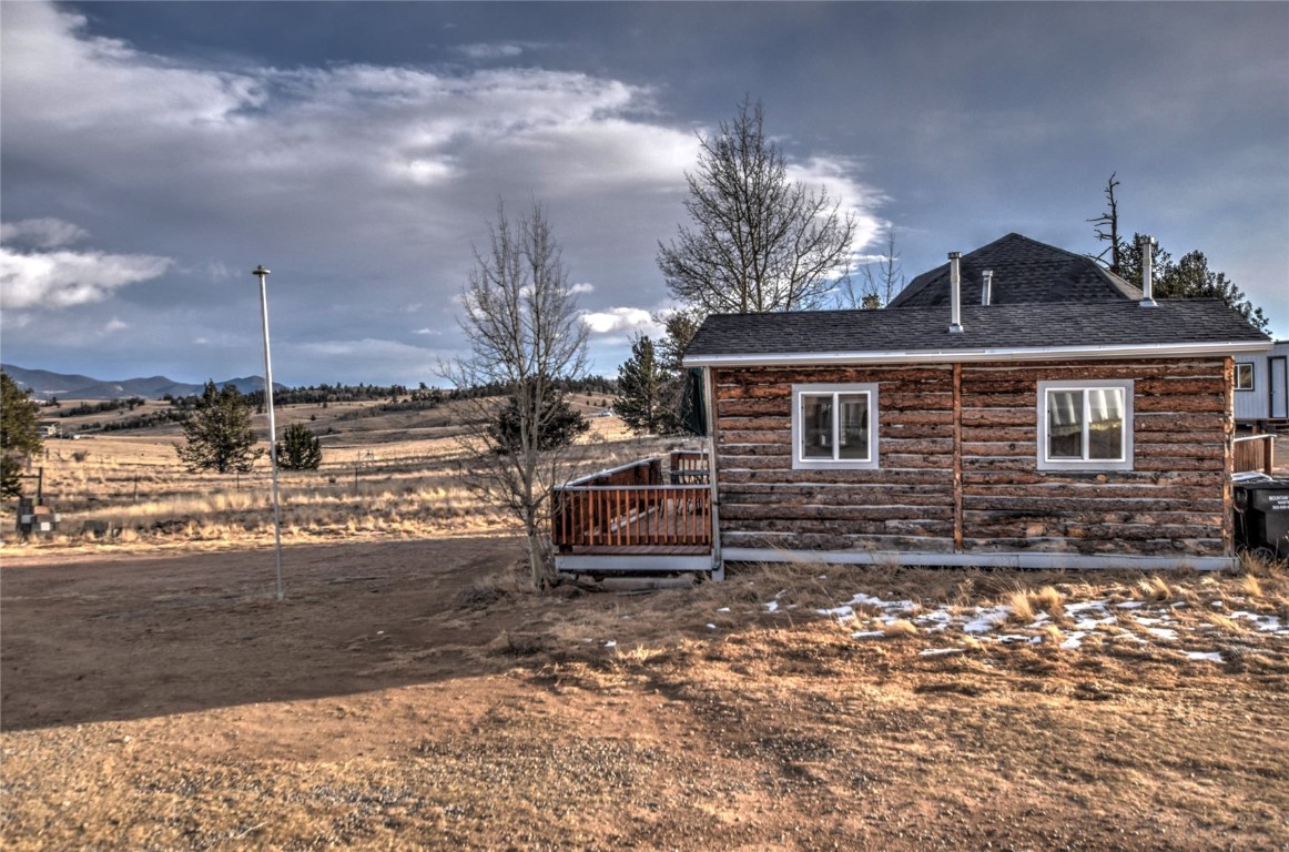 810 Buffalo Ridge Road Como, CO 80432 - Photo 5 of 31 a front view of a house with a yard
