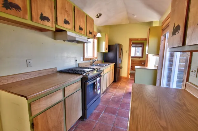 a view of swimming pool with seating area
