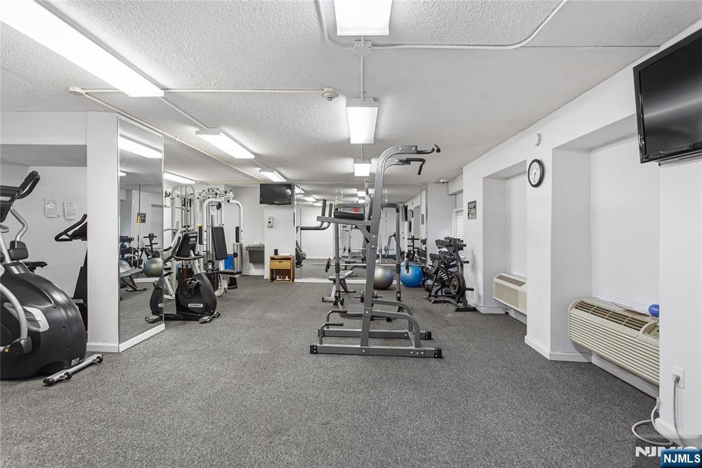 150 Overlook Avenue, Unit 6E Hackensack, NJ 07601 - Photo 26 of 30 a view of a room with gym equipment