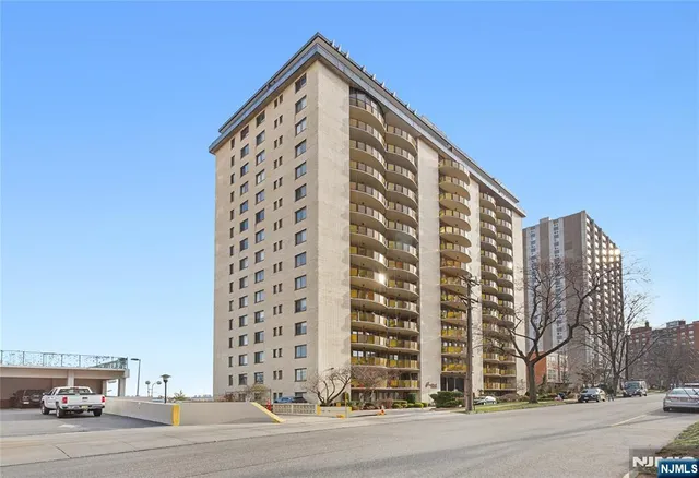 a view of city with tall buildings