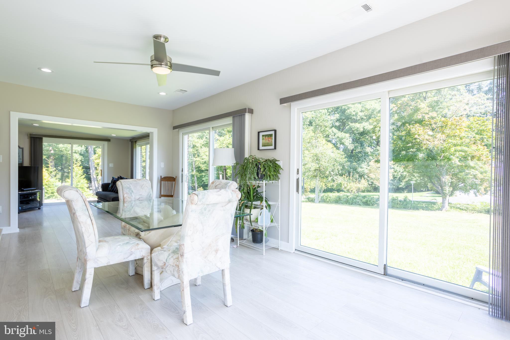 13829 Manor Glen Road Baldwin, MD 21013 - Photo 18 of 82 a view of a dining room with furniture window and outside view