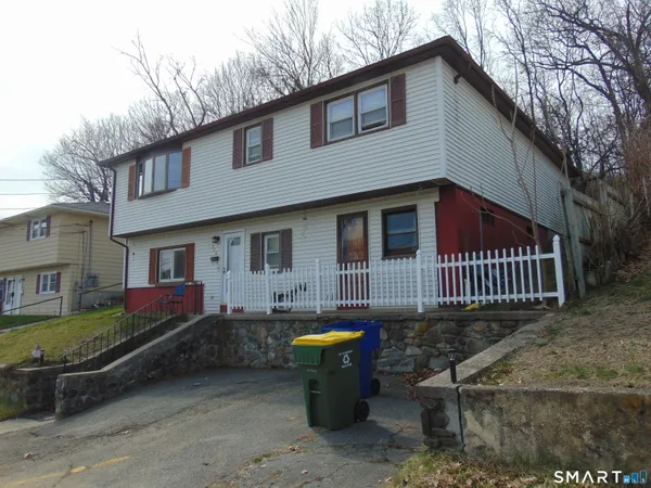 a view of a house with a patio