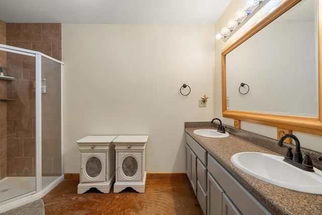 a bathroom with a sink and a mirror