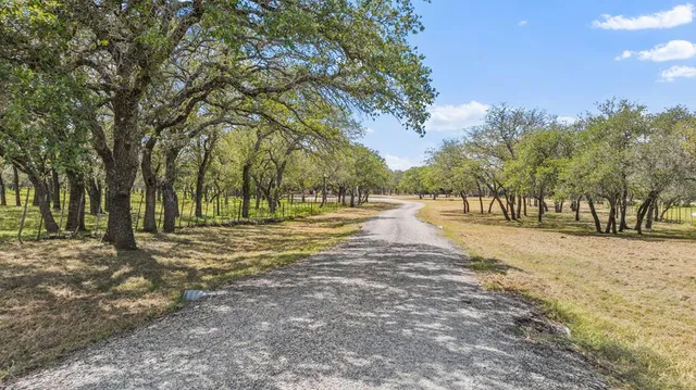 a view of road with trees