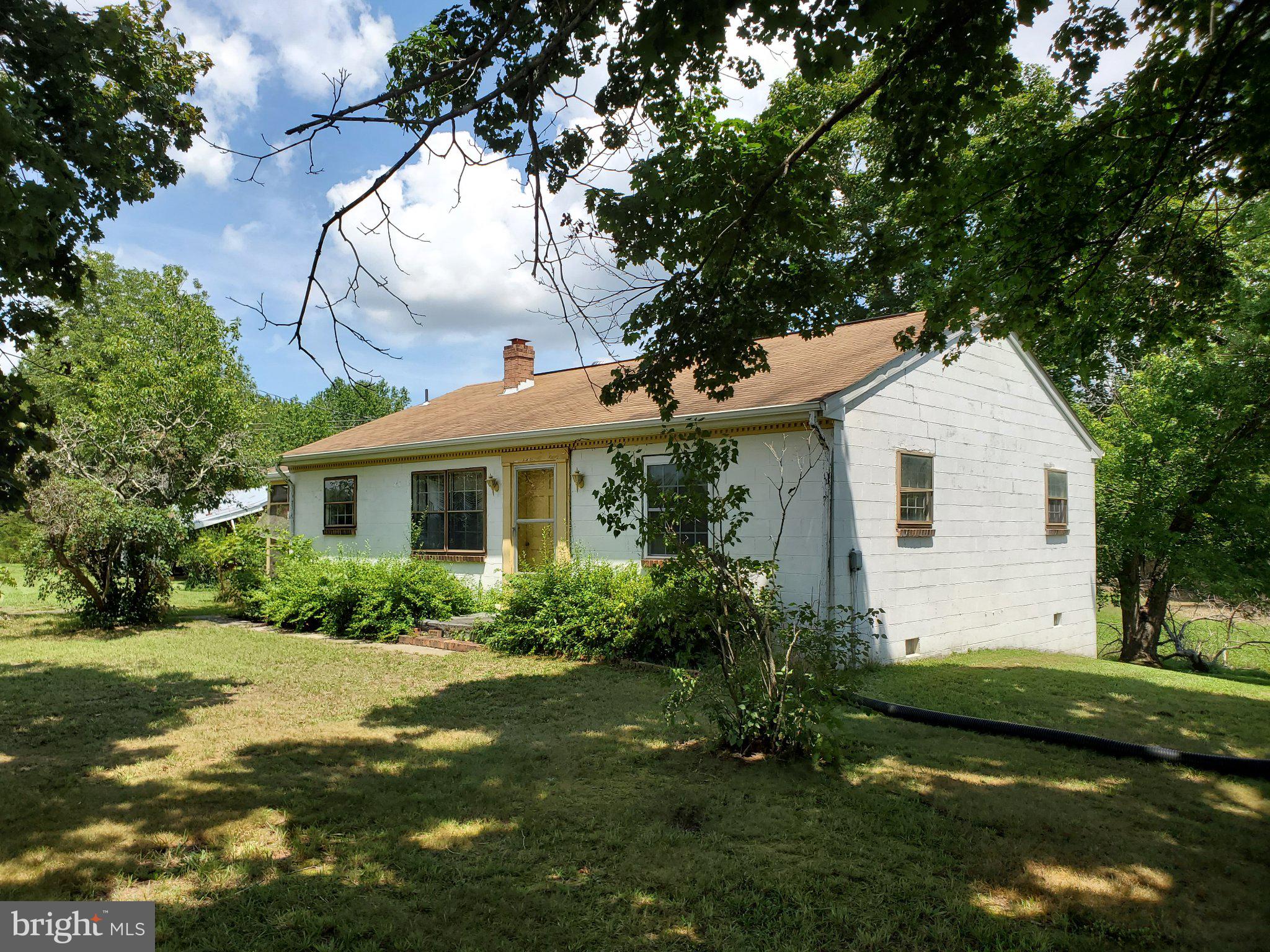 24323 Bagby Road Milford, VA 22514 - Photo 1 of 4 Charming home nestled in nature's embrace.