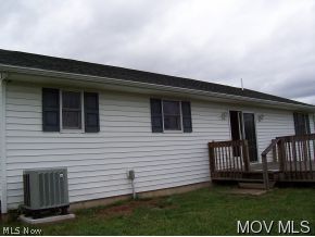630 Mercer Road Stockport, OH 43787 - Photo 2 of 11 Back view with deck