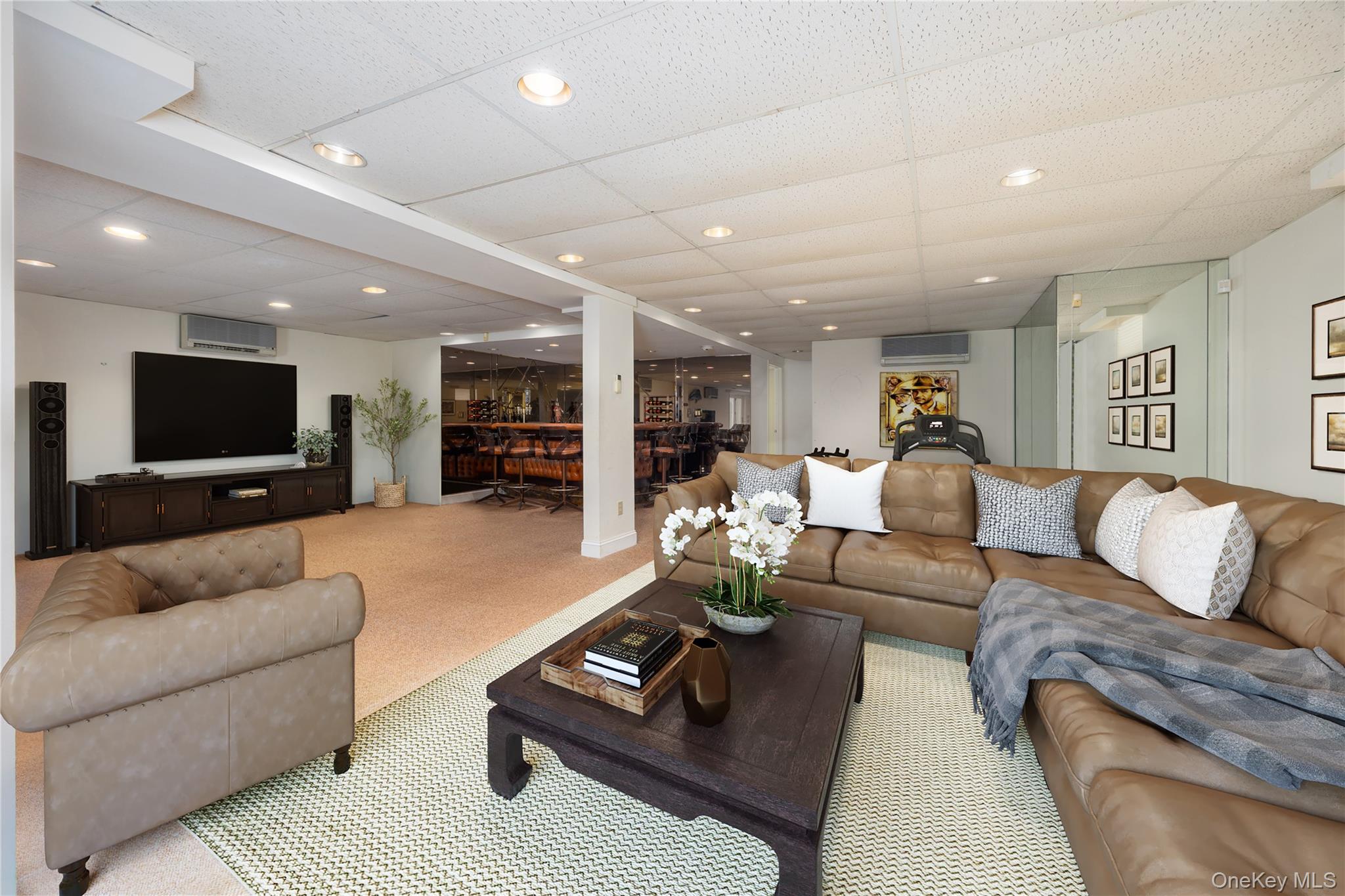 219 Maple Avenue Monroe, NY 10950 - Photo 24 of 40 a living room with furniture and a flat screen tv