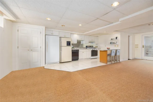 a view of a chairs and table in a patio