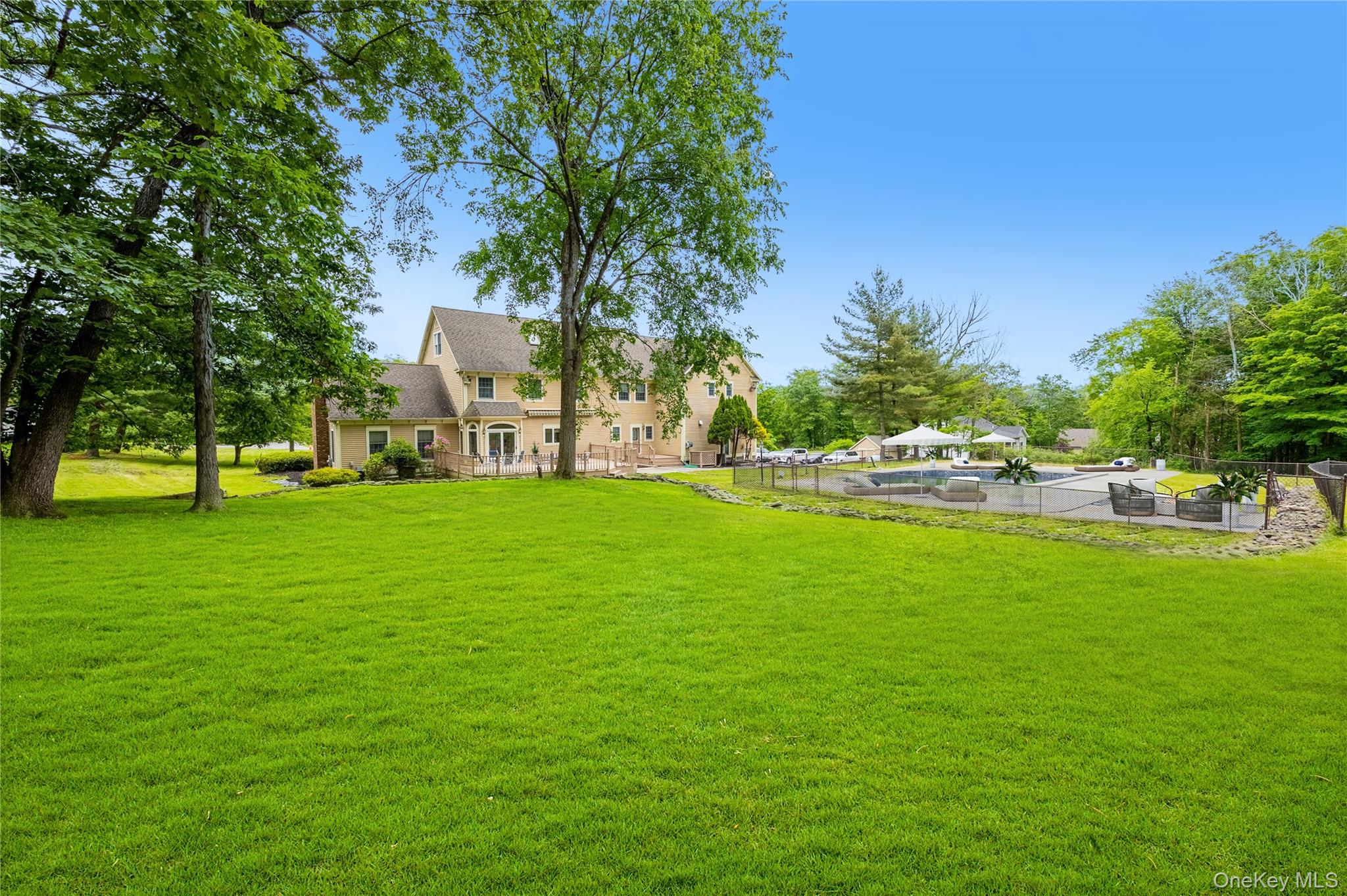 219 Maple Avenue Monroe, NY 10950 - Photo 33 of 40 a view of house with garden and trees