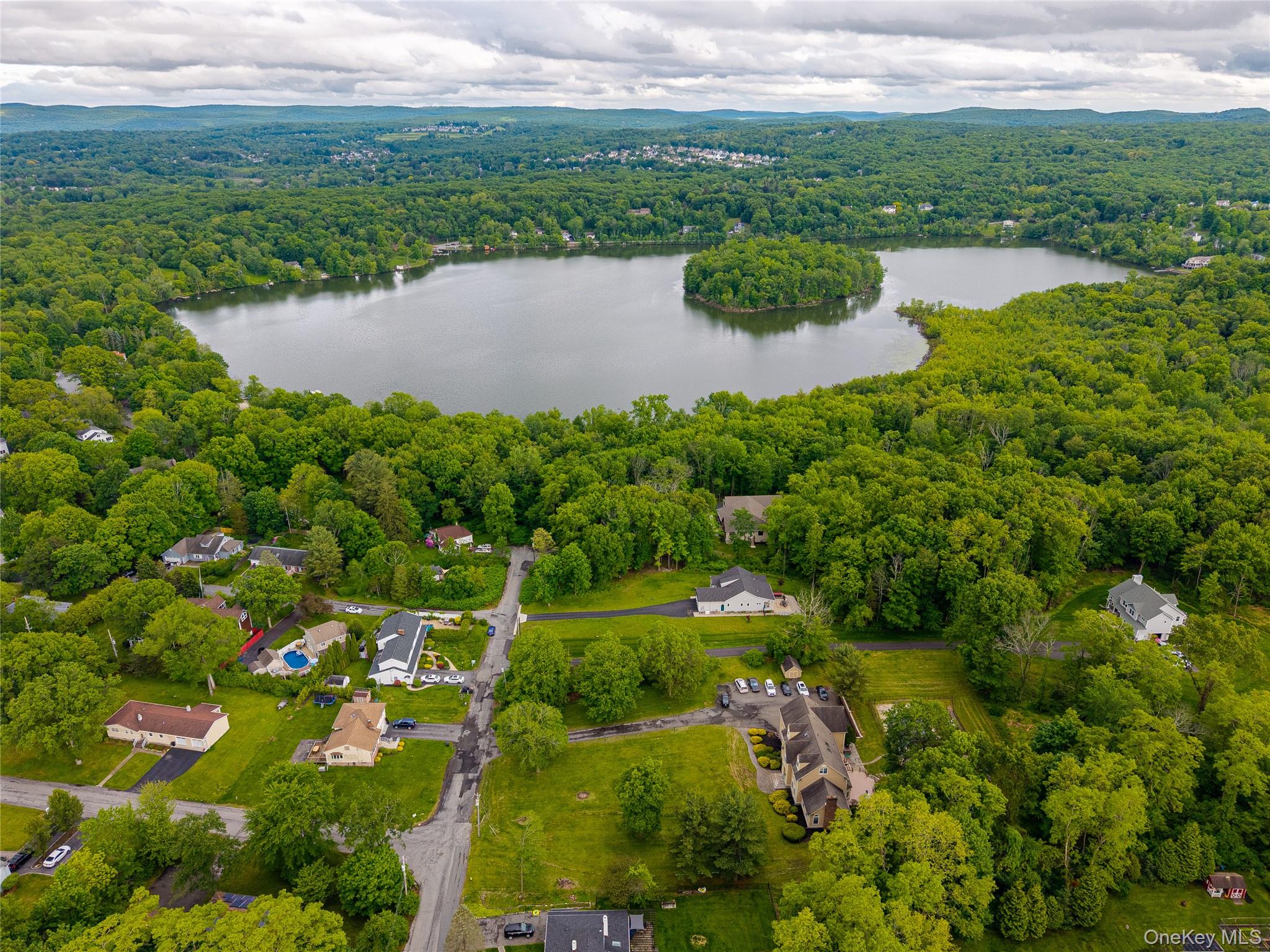 219 Maple Avenue Monroe, NY 10950 - Photo 34 of 40 a view of a lake with a city