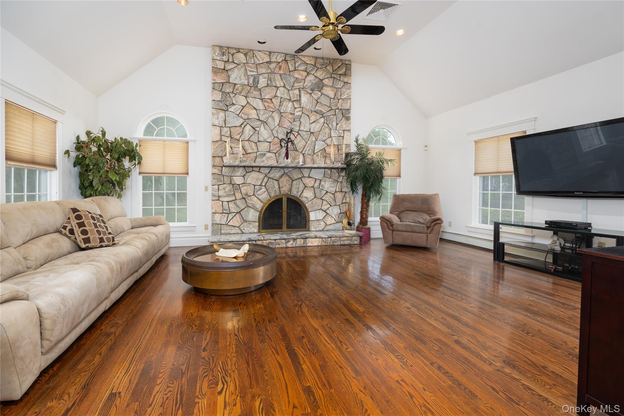 219 Maple Avenue Monroe, NY 10950 - Photo 9 of 40 a living room with furniture and a fireplace