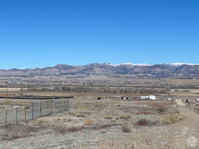Property is behind the fenced in acreage.
