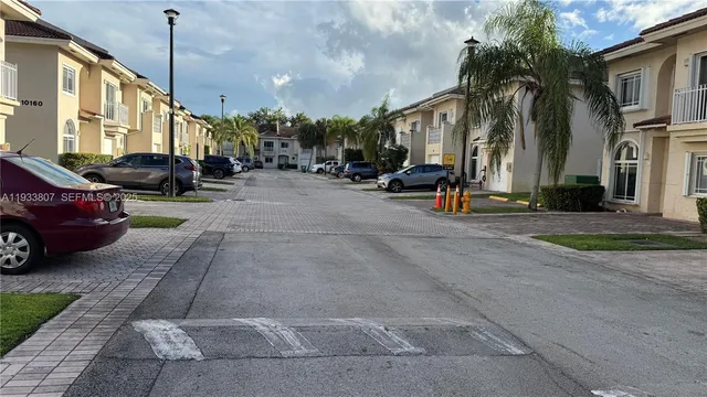 a view of a street with cars
