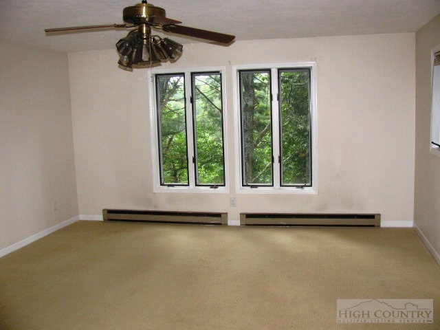 153 Alpine Court Boone, NC 28607 - Photo 12 of 13 a view of an empty room with a window