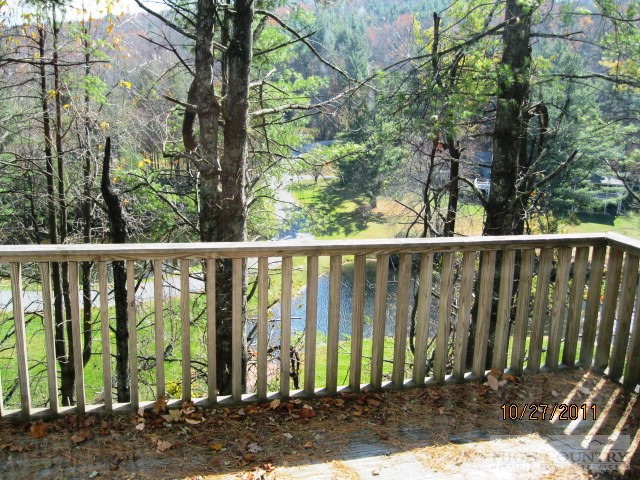 153 Alpine Court Boone, NC 28607 - Photo 8 of 13 a view of a wooden fence