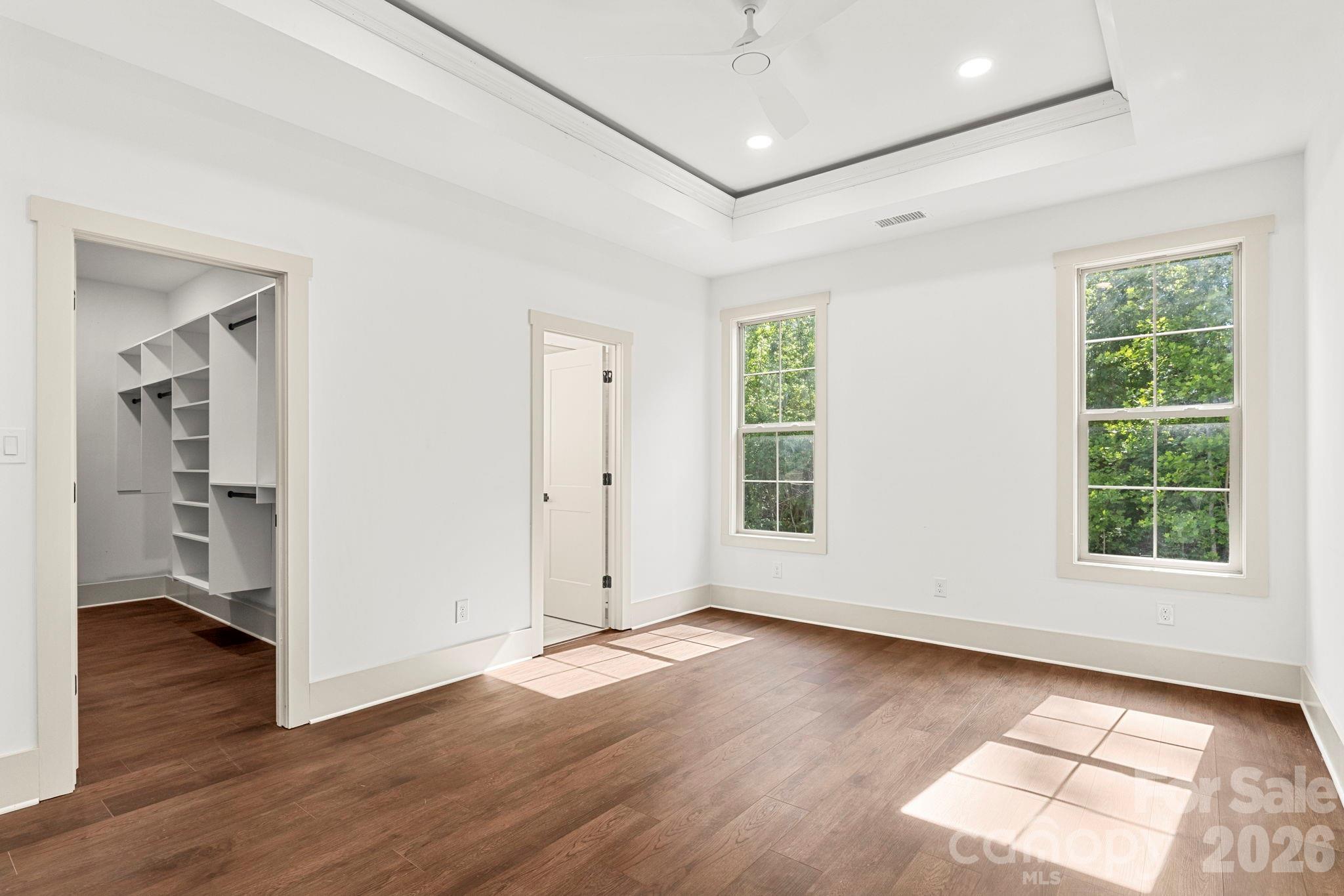1167 Tirzah Road Rock Hill, SC 29732 - Photo 11 of 25 a view of an empty room with wooden floor and a window