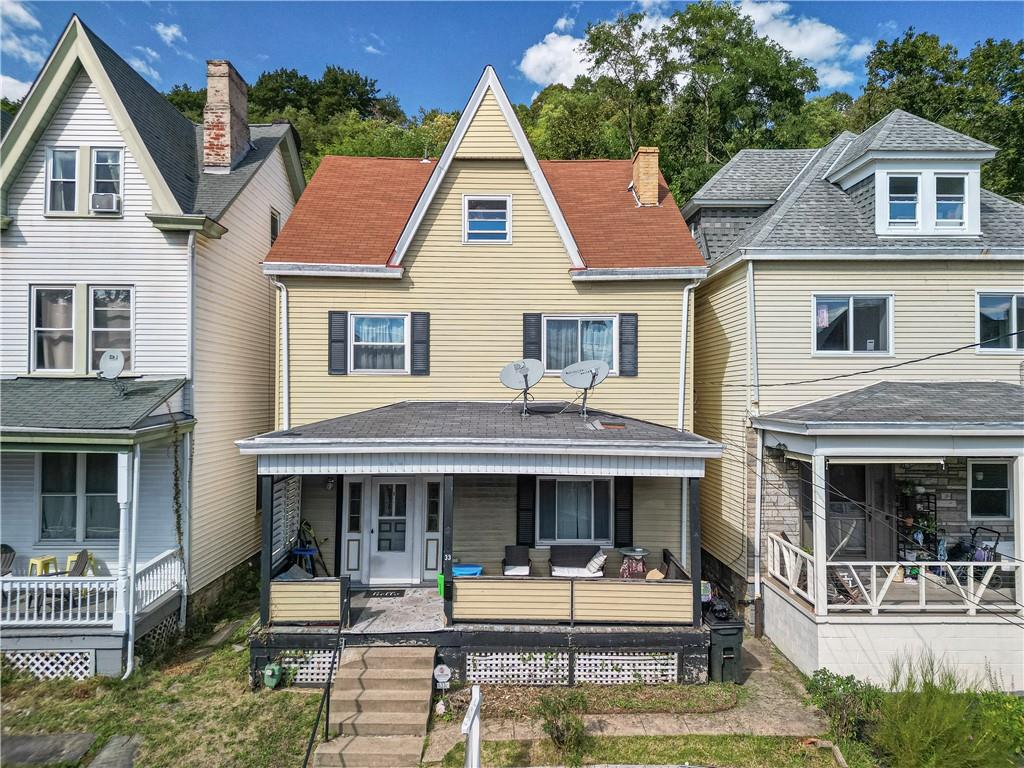 33 5th Street Pittsburgh, PA 15215 - Photo 38 of 43 a front view of a house with garden