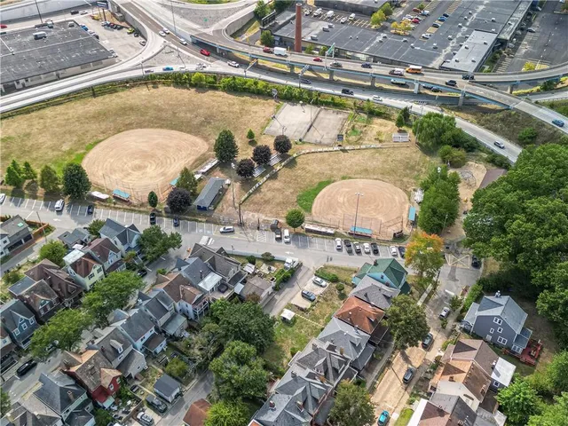 a aerial view of a house with a lake view