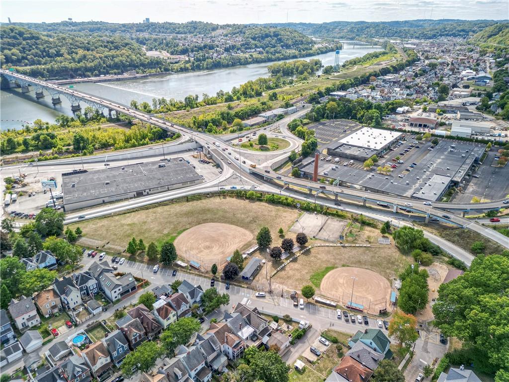33 5th Street Pittsburgh, PA 15215 - Photo 41 of 43 an aerial view of a house with a lake view