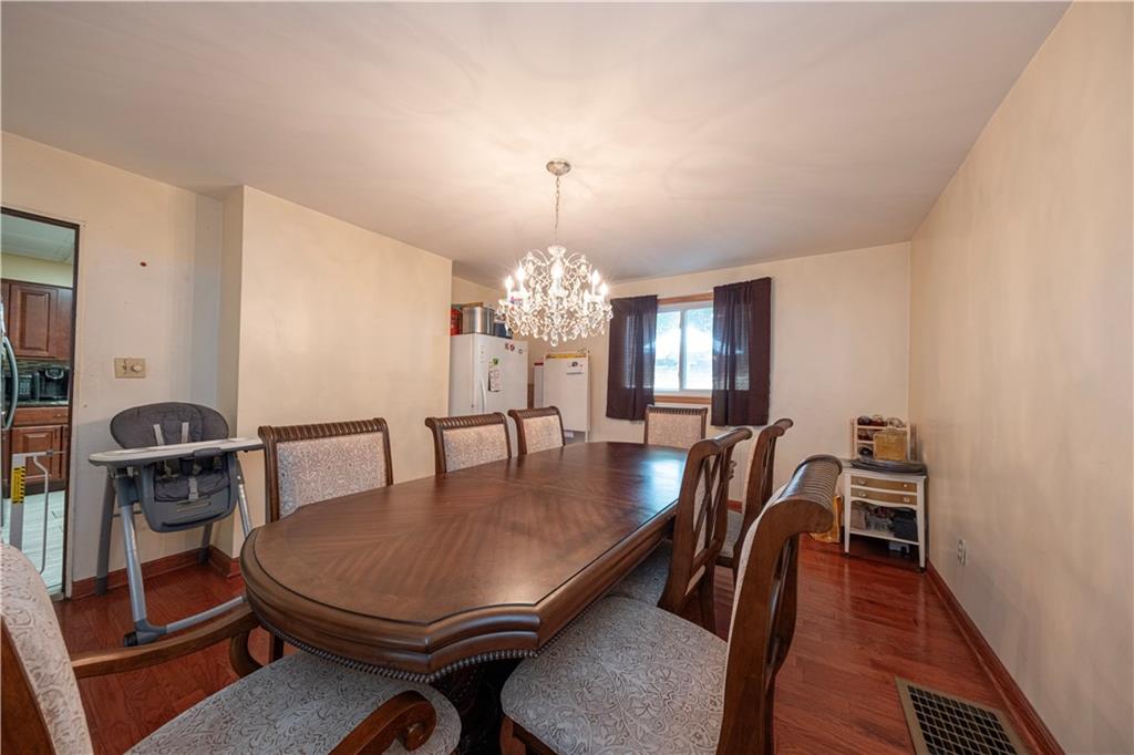 33 5th Street Pittsburgh, PA 15215 - Photo 8 of 43 a view of a dining room with furniture and wooden floor