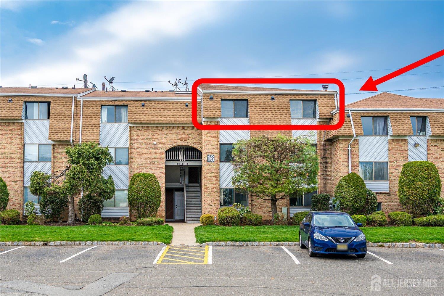 a car parked in front of a house