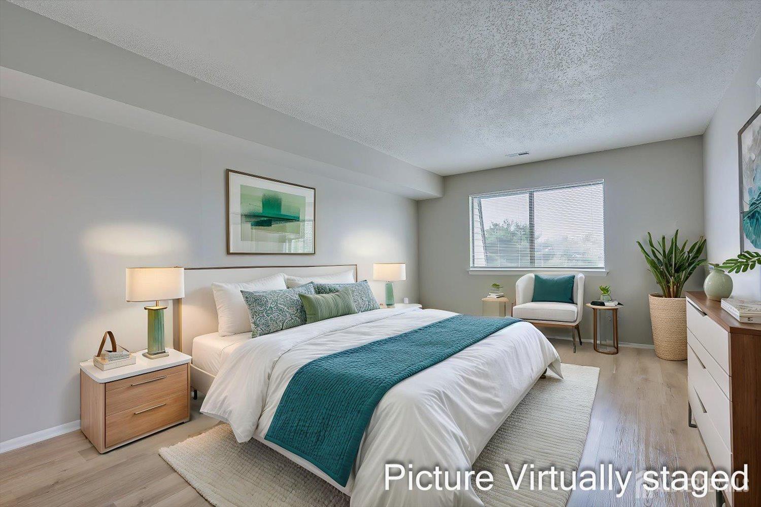 1607 Edison Glen Terrace Edison, NJ 08837 - Photo 13 of 19 a bed sitting in a bedroom next to a window with potted plant