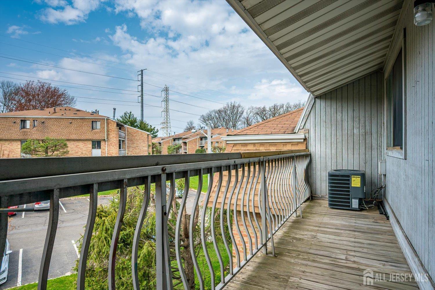 1607 Edison Glen Terrace Edison, NJ 08837 - Photo 18 of 19 a view of balcony with wooden floor