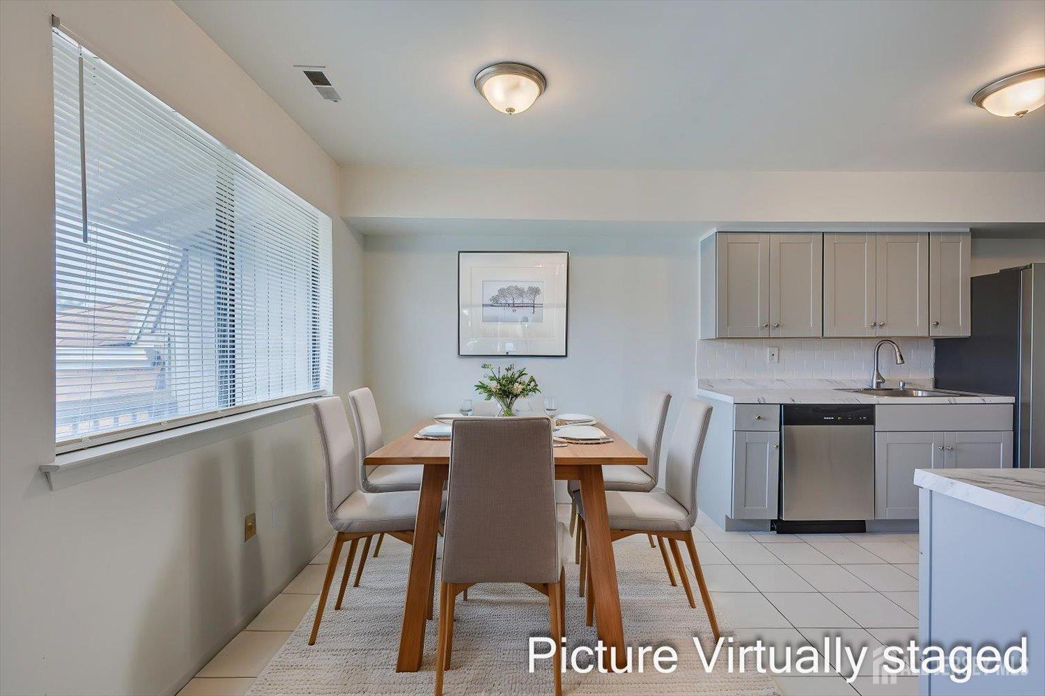 1607 Edison Glen Terrace Edison, NJ 08837 - Photo 6 of 19 a view of a dining room with furniture and a window