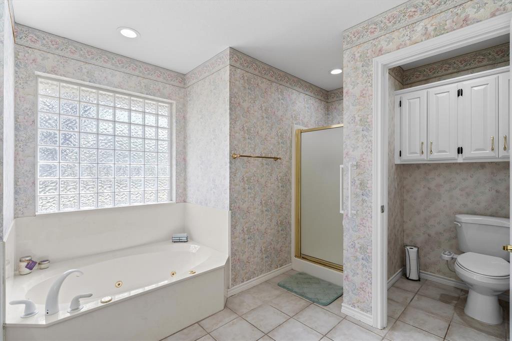 271 VZ County Road Canton, TX 75103 - Photo 24 of 40 a bathroom with a bathtub toilet and shower