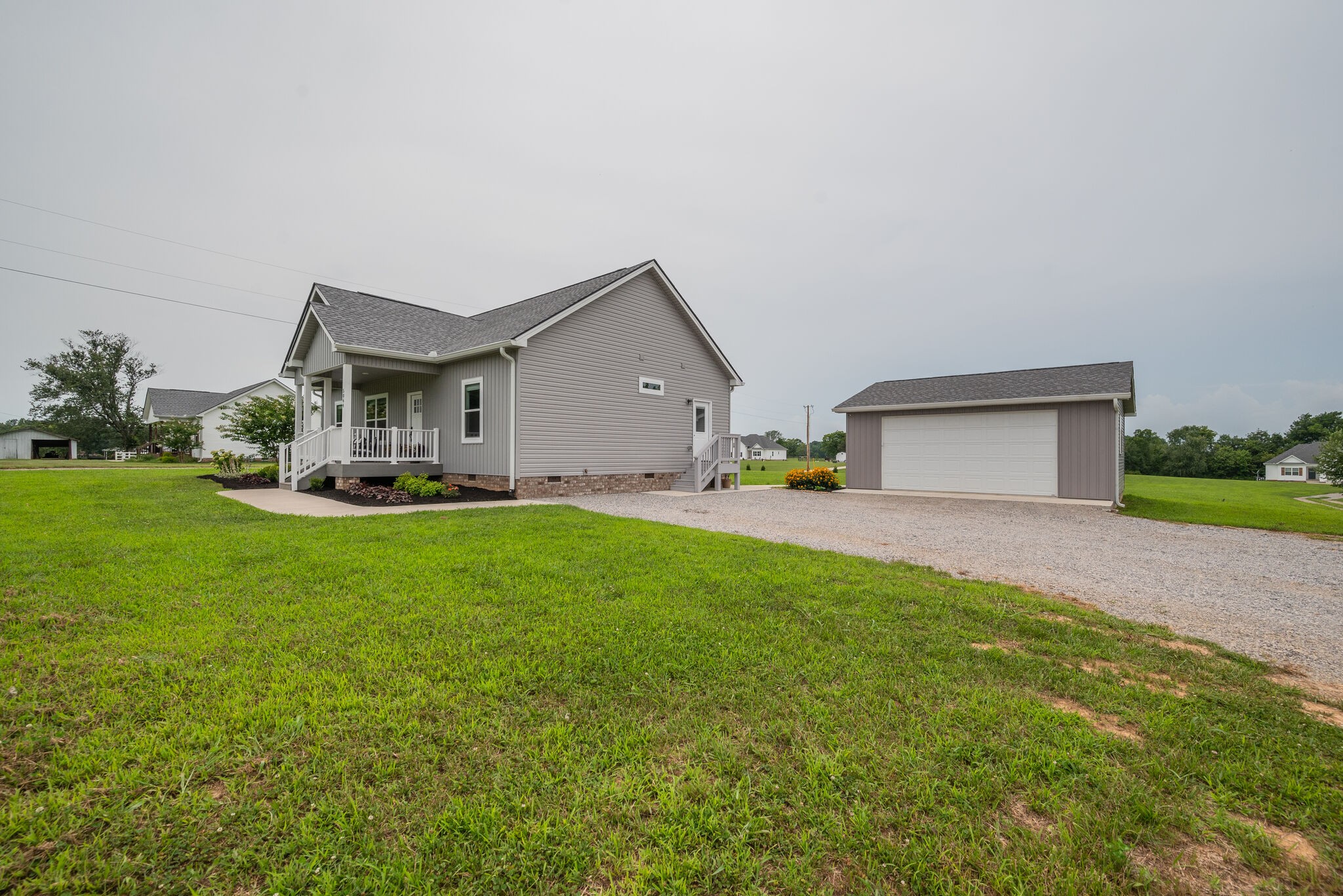 5064 Hyde Road Springfield, TN 37172 - Photo 3 of 26 a front view of a house with garden