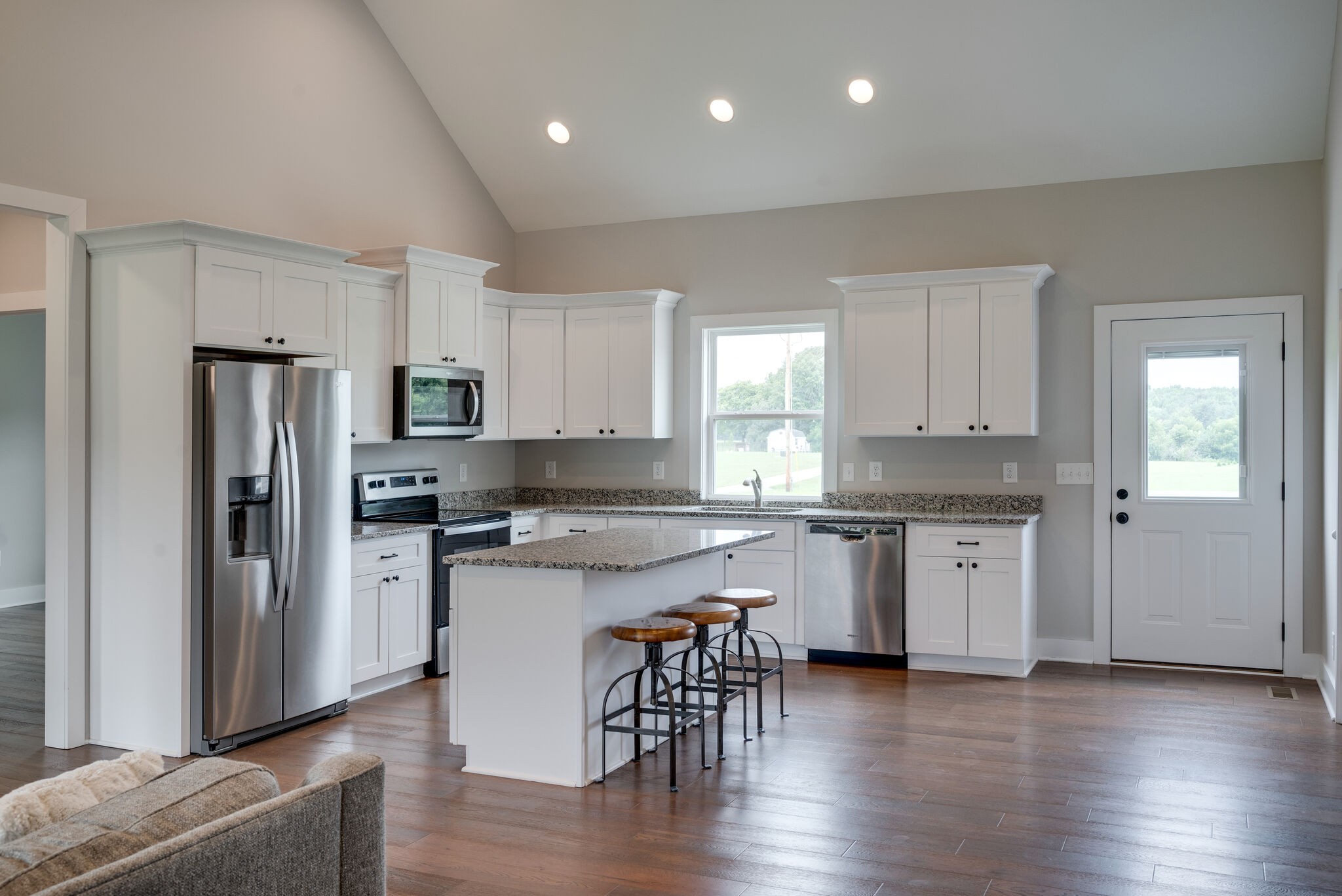5064 Hyde Road Springfield, TN 37172 - Photo 8 of 26 a kitchen with a refrigerator and a stove top oven