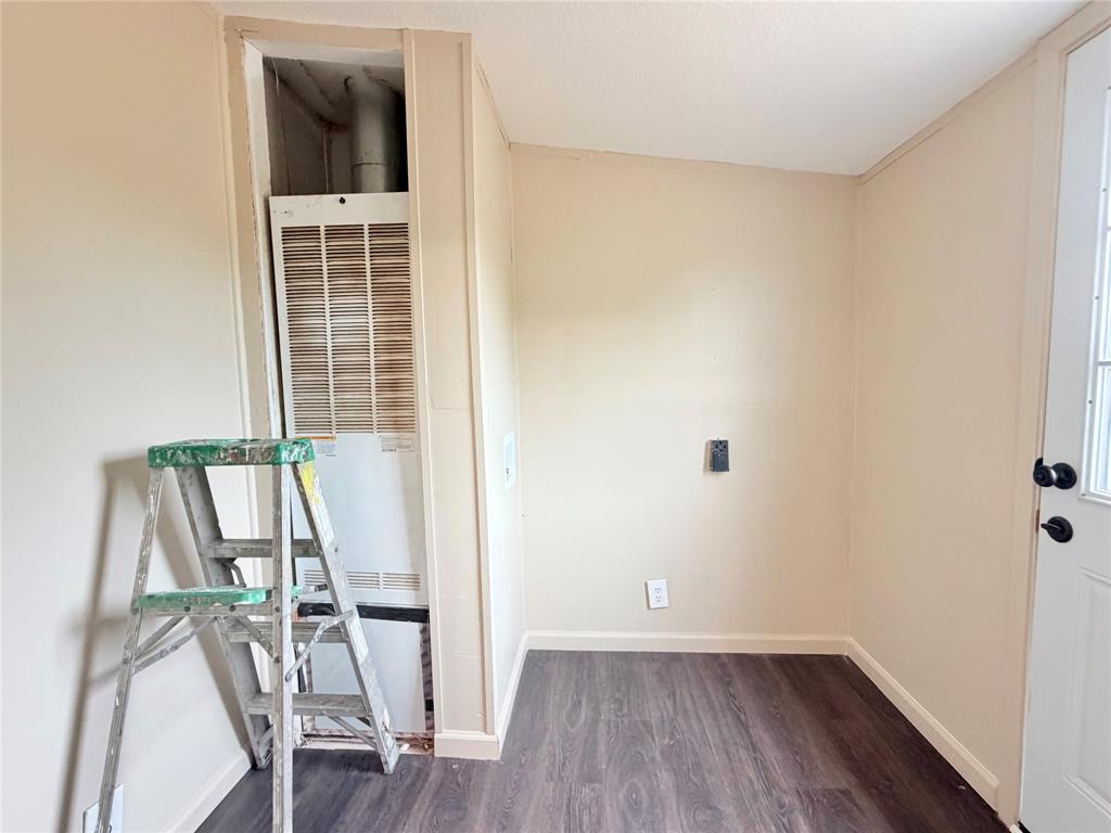 9721 Limestone Joshua, TX 76058 - Photo 32 of 36 an empty room with wooden floor and windows