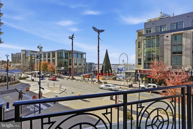 a view of swimming pool with outdoor seating