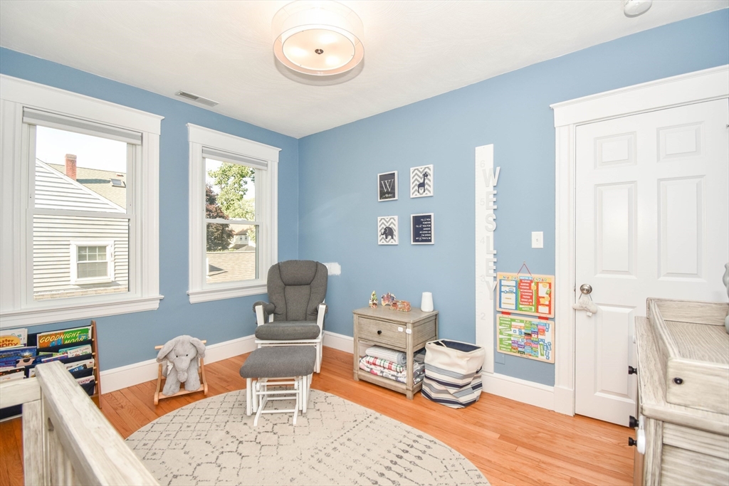 72 Evans Street, Unit 72 Watertown, MA 02472 - Photo 21 of 34 a living room with furniture and a window