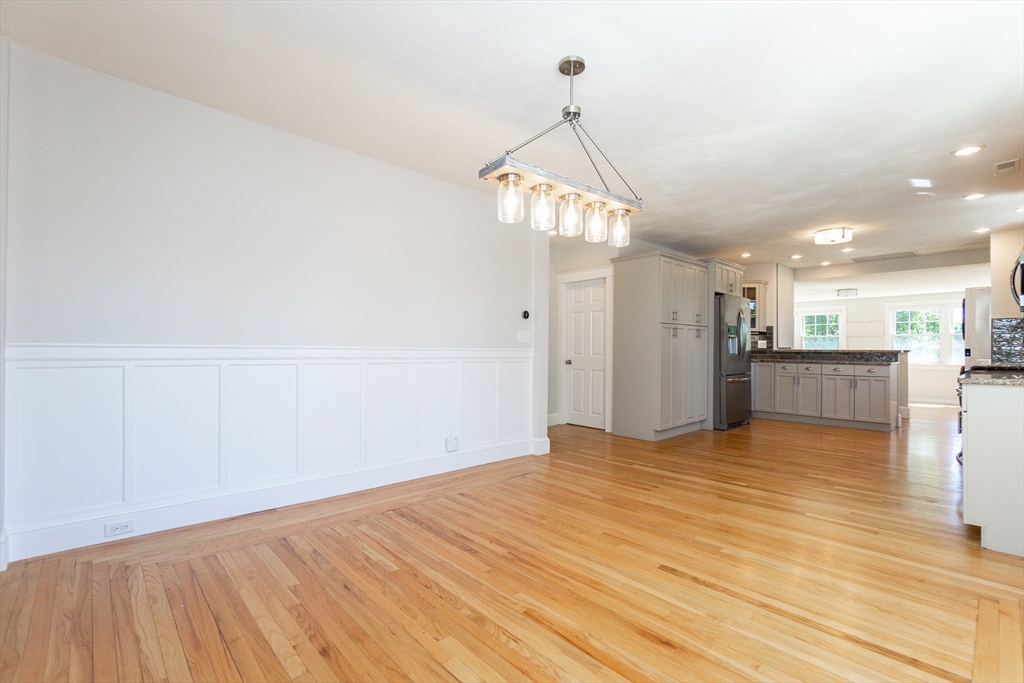72 Evans Street, Unit 72 Watertown, MA 02472 - Photo 8 of 34 a view of a livingroom with a chandelier